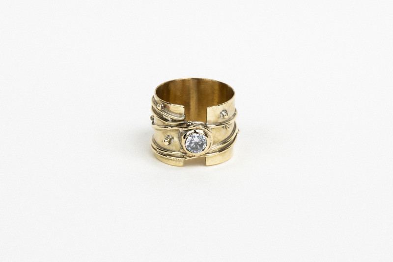Wide Granulated Band with Faced Stone