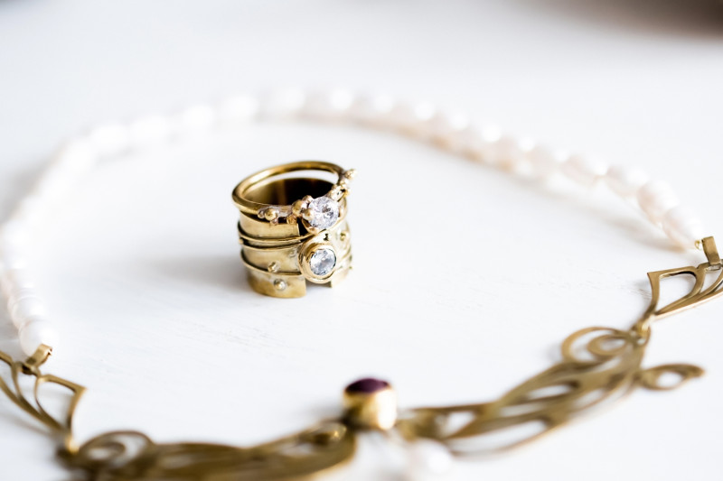 Wide Granulated Band with Faced Stone