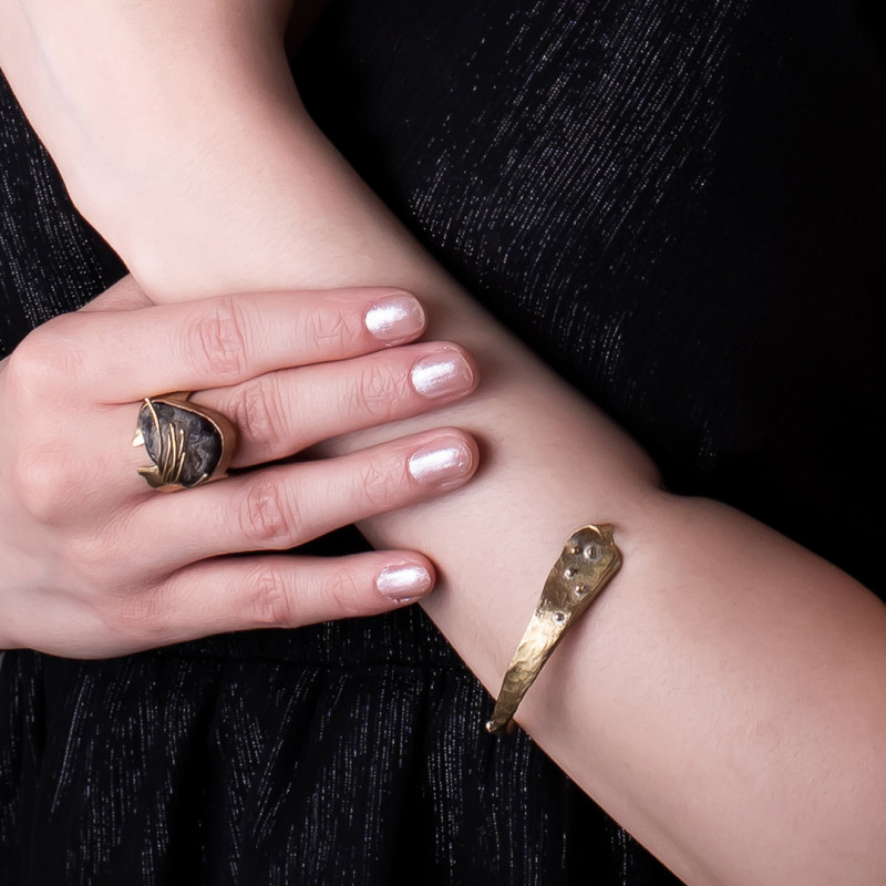 Band Ring with Hugged Stone