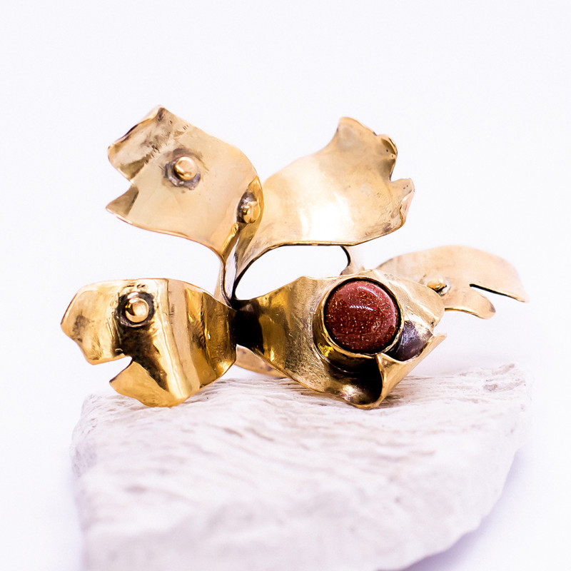 Goldstone Set on Petals Ring
