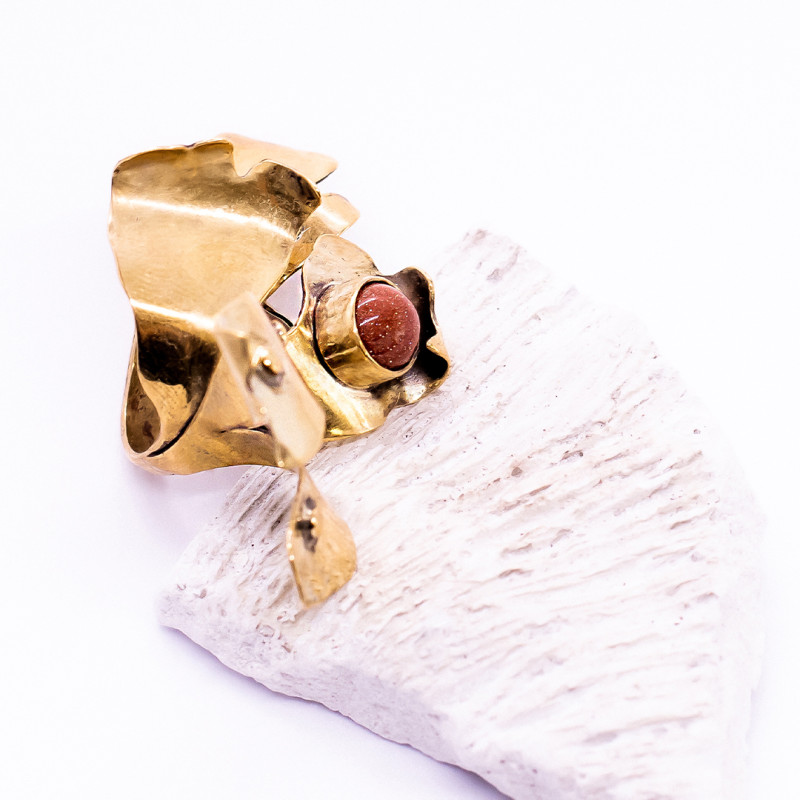 Goldstone Set on Petals Ring